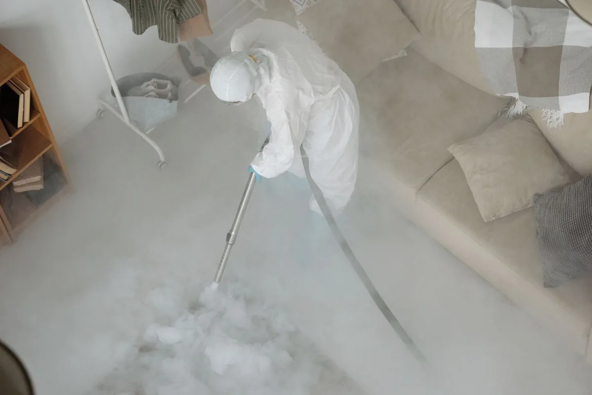 Biohazard cleanup technician in protective equipment, Montclair, VA